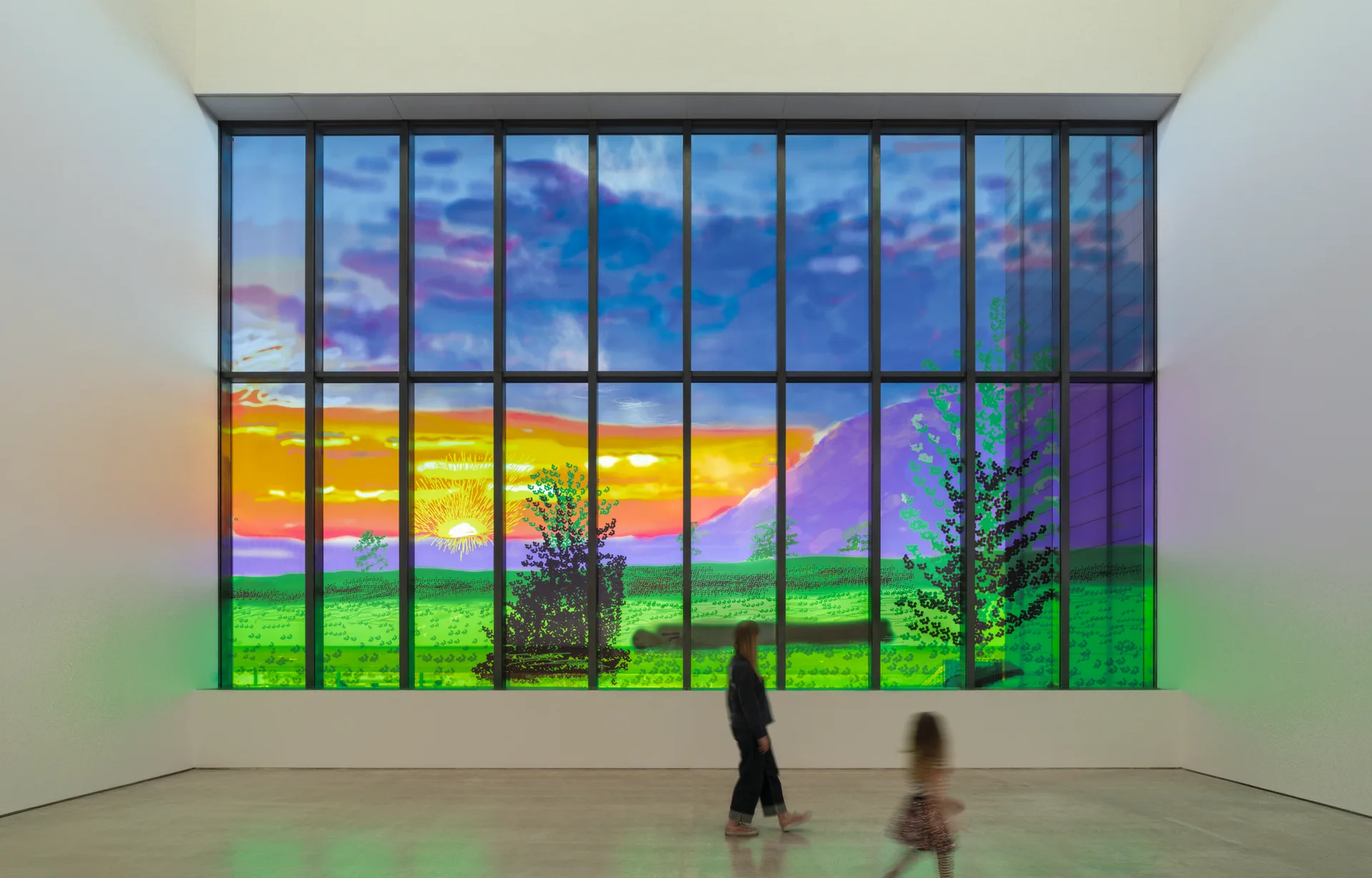 一项大型装置艺术将画廊标志性的窗户改造成一件发光的艺术品，日夜可见。.